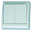 Doble conmutador de cruzamiento de superficie blanco LG80 Focus, 80x80mm. 10A, 250V- Policarbonato.